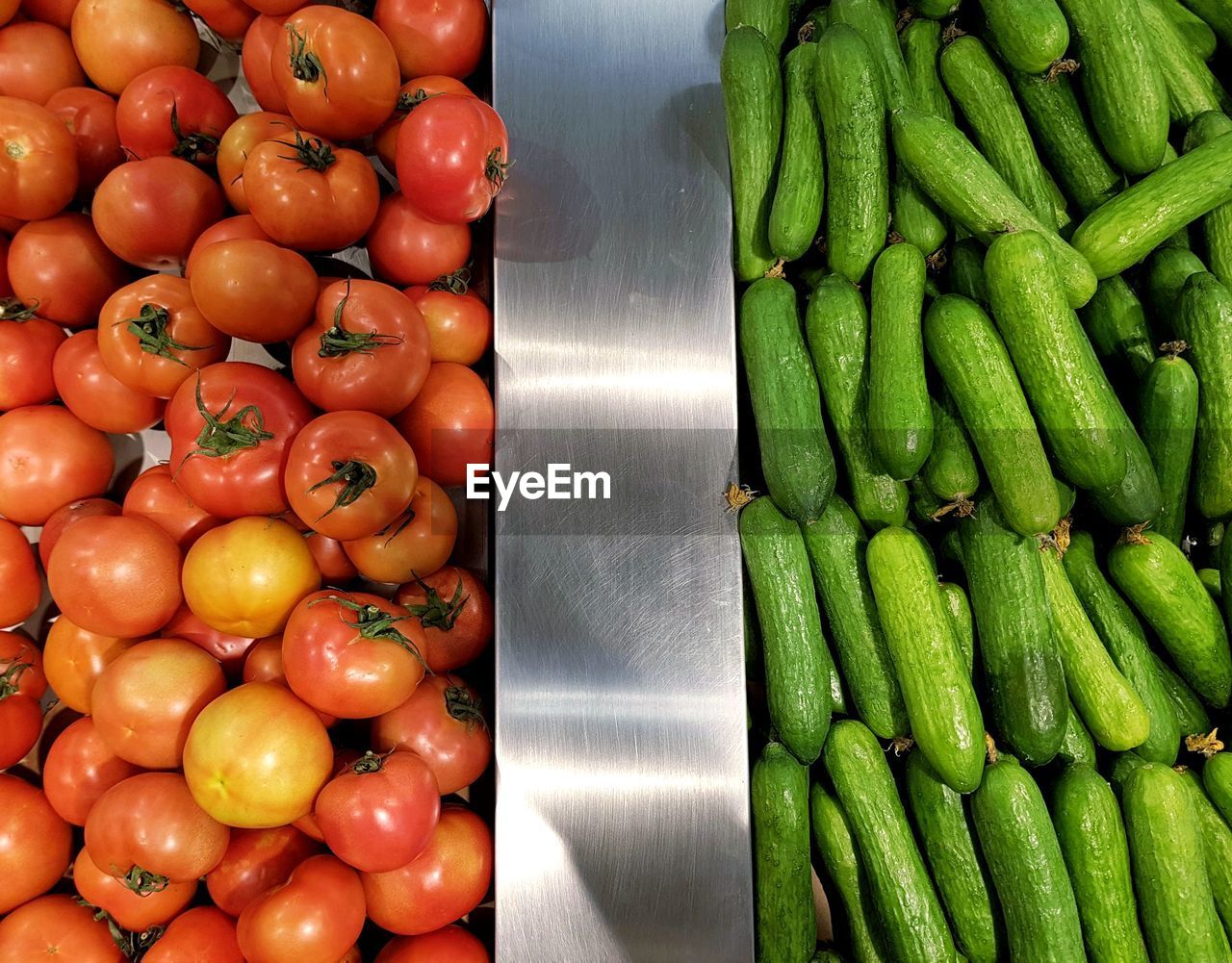 HIGH ANGLE VIEW OF VEGETABLES AT MARKET STALL