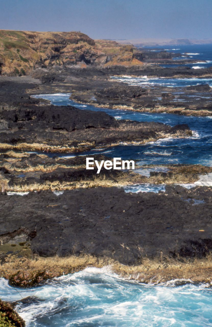 Rugged shoreline Blue Coast Coastline Film Photography Filmisnotdead Landscape Nature Ocean Outdoors Rocks Sea Seascape Vacations Waves Waves, Ocean, Nature Australia Scenics Rock Formation The Great Outdoors - 2017 EyeEm Awards