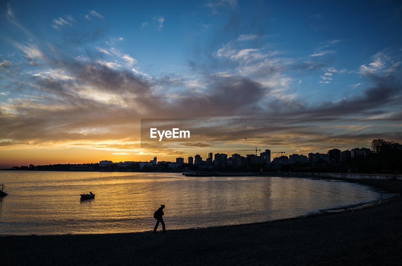 Bay of water at sunset