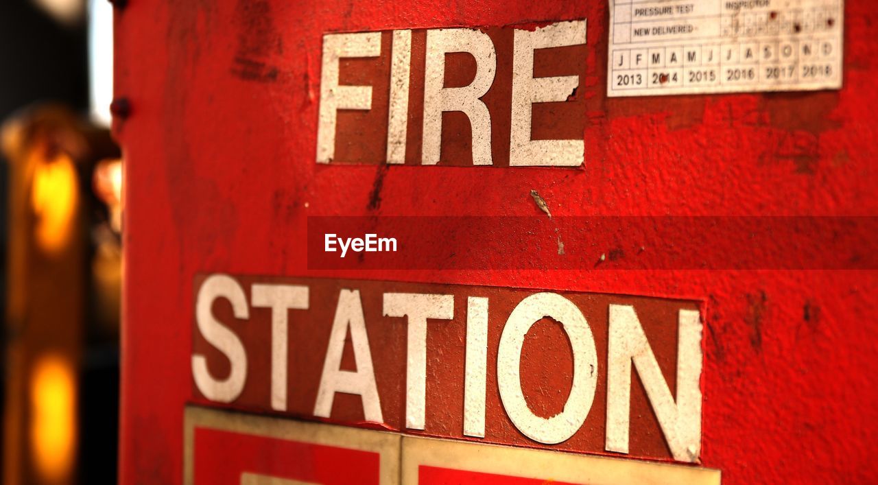 Close-up of fire station sign