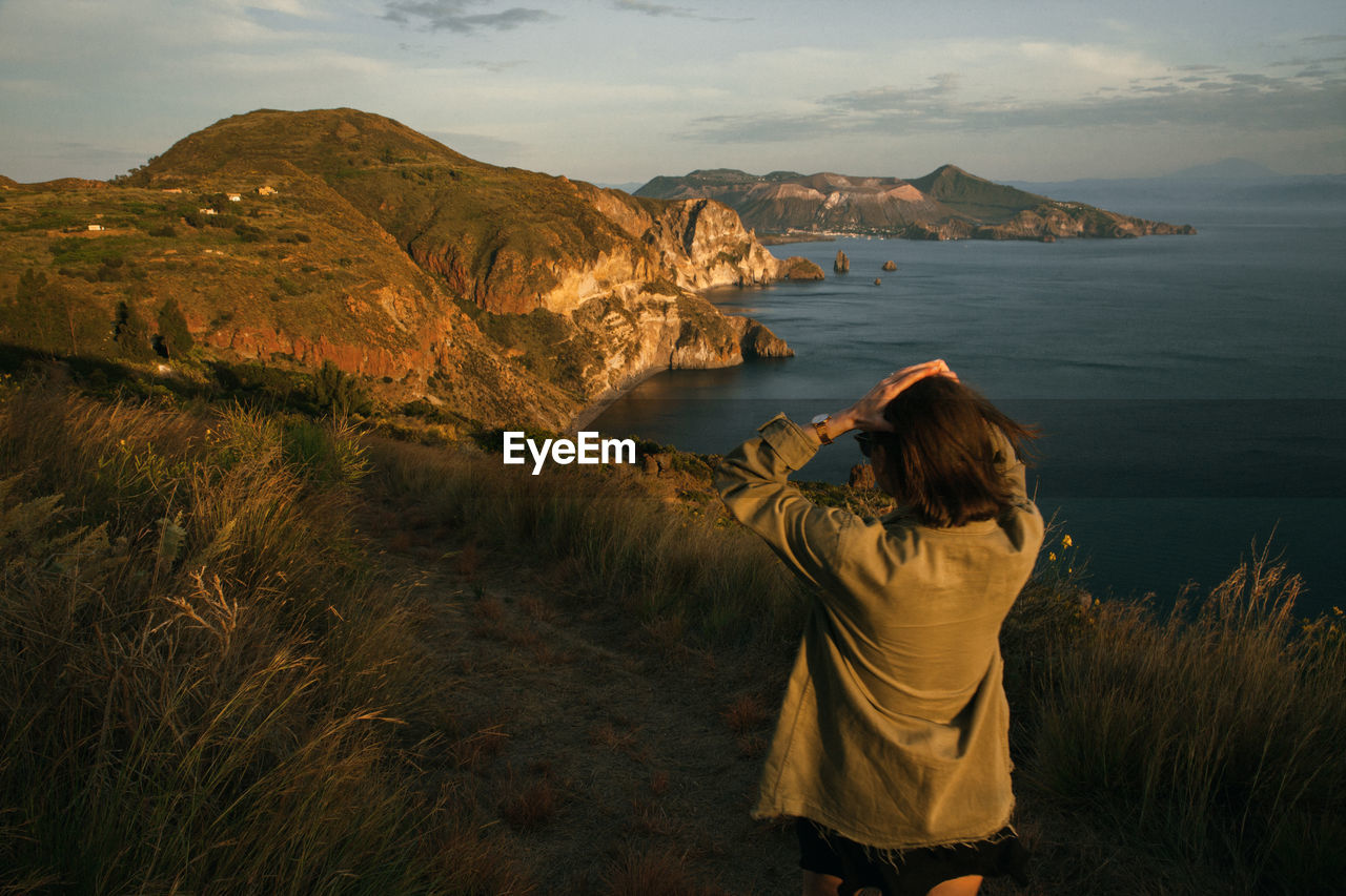 Rear view of woman on looking at landscape