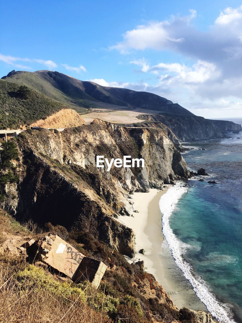 View of calm beach against the sky