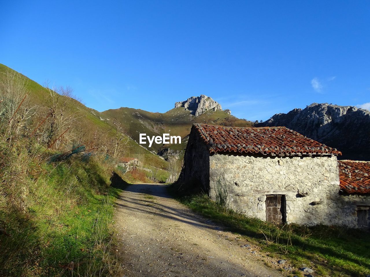 ROAD PASSING THROUGH LANDSCAPE