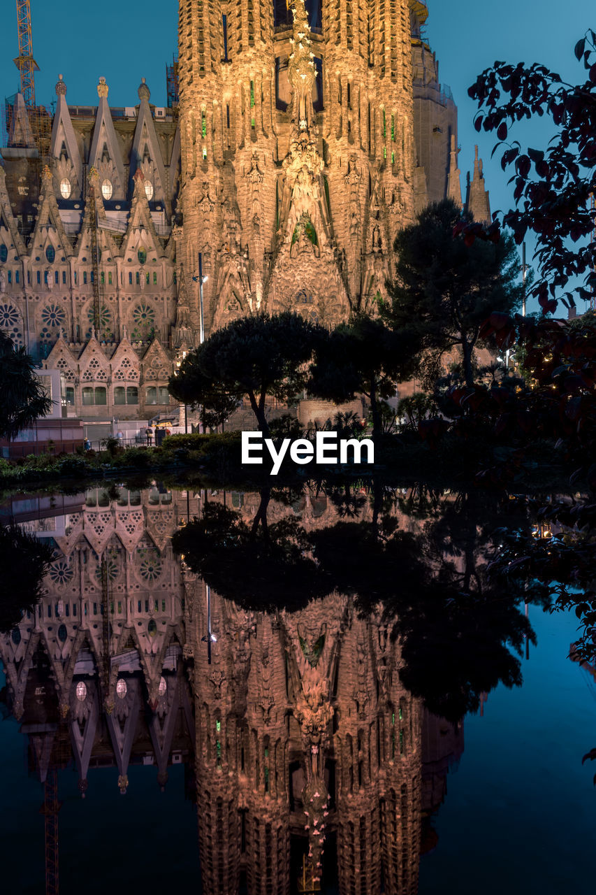 REFLECTION OF TEMPLE IN CITY