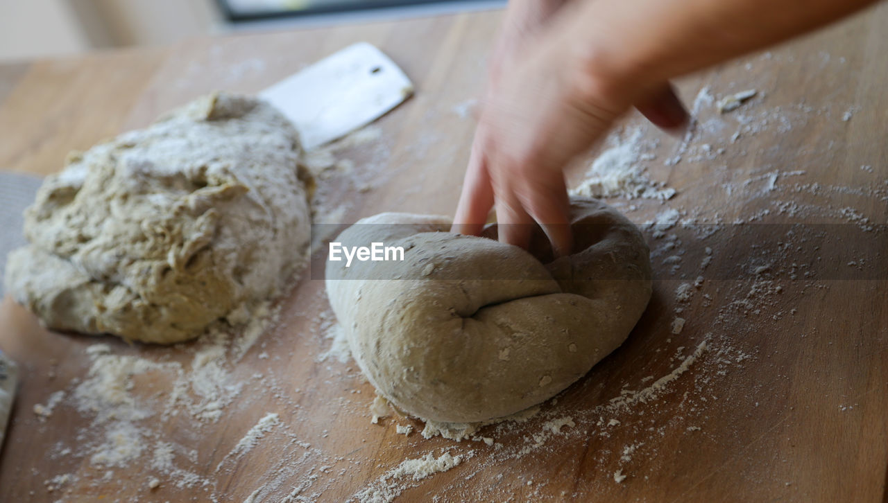 Woman baking bread at home