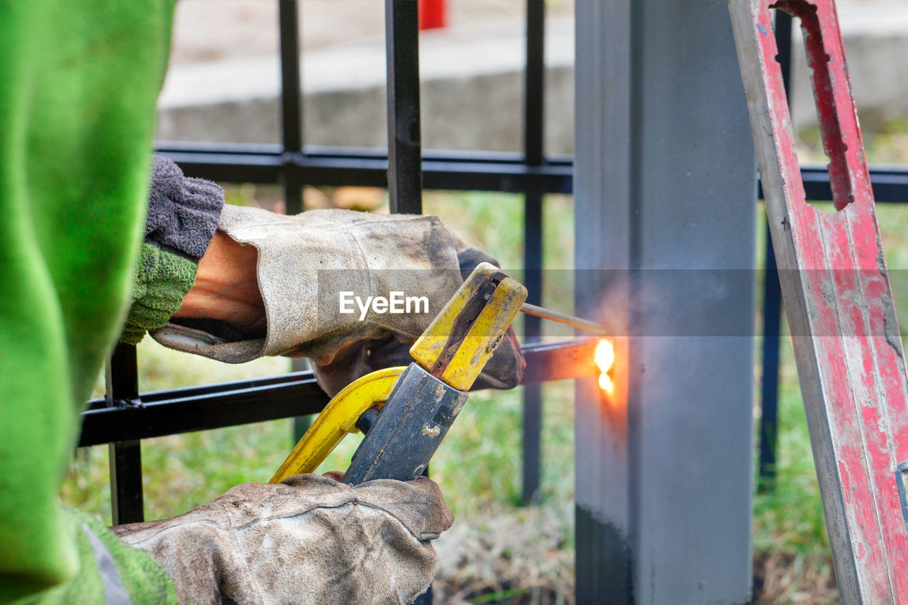 Man working on metal structure