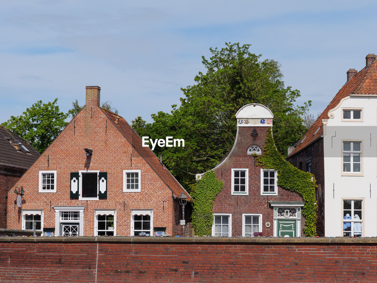 HOUSES AGAINST SKY IN CITY