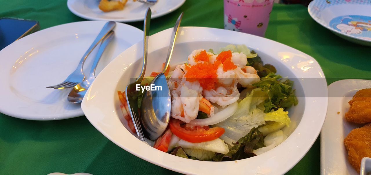 food and drink, food, plate, healthy eating, lunch, freshness, wellbeing, meal, table, seafood, dish, asian food, cuisine, no people, vegetable, serving size, appetizer, high angle view, business, bowl, restaurant, indoors, close-up, eating utensil