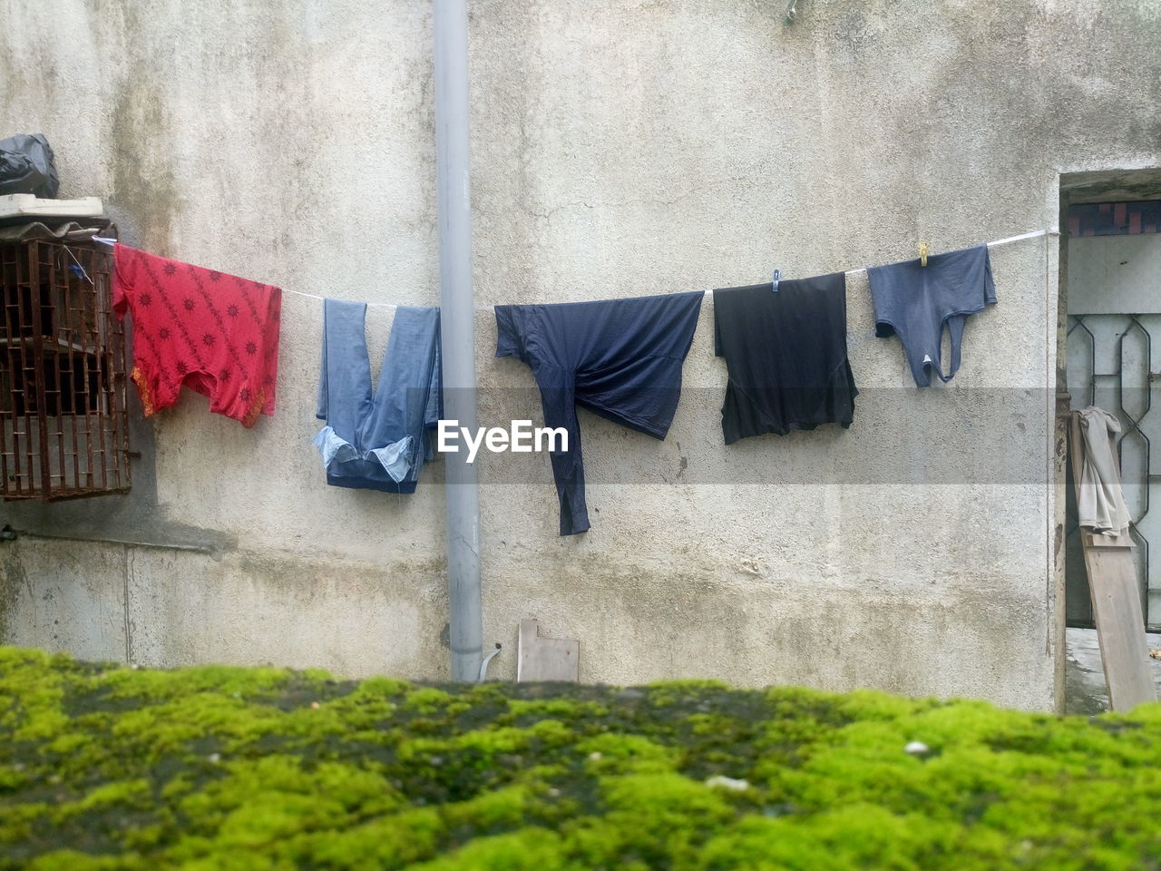 Clothes drying against building