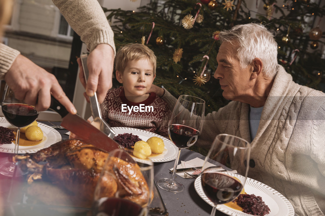Family christmas dinner with turkey