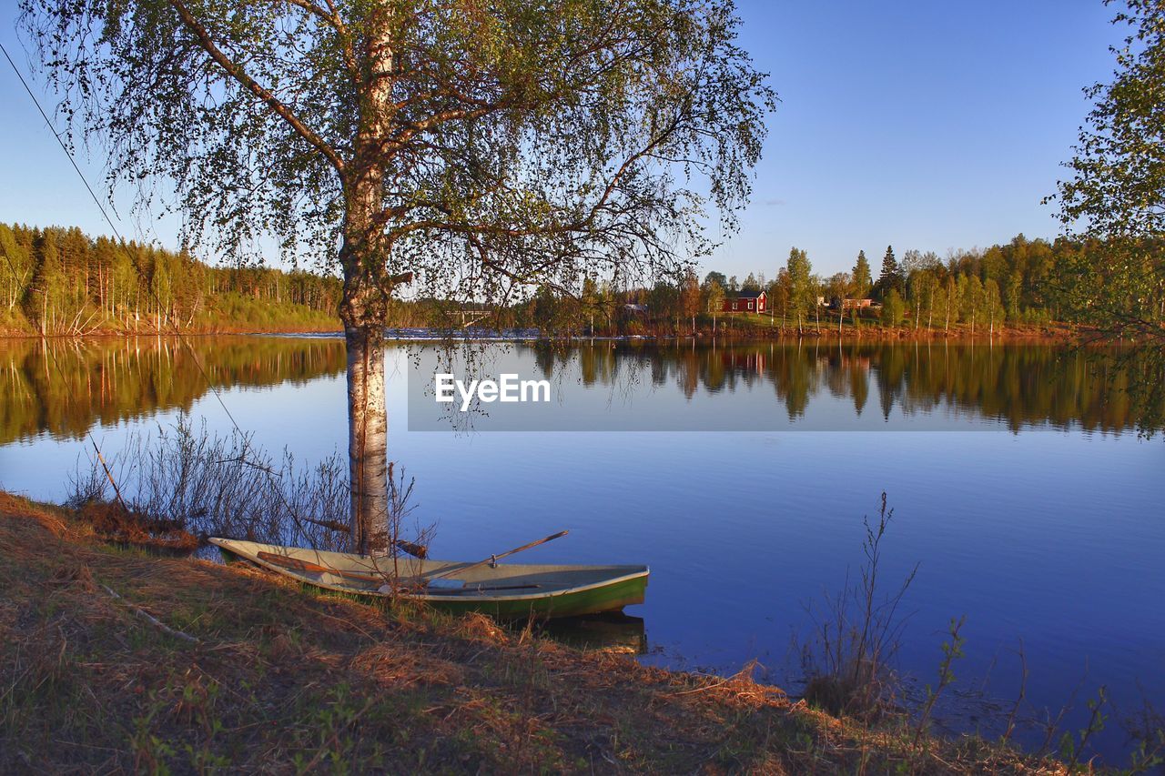 Scenic view of lake against sky during autumn