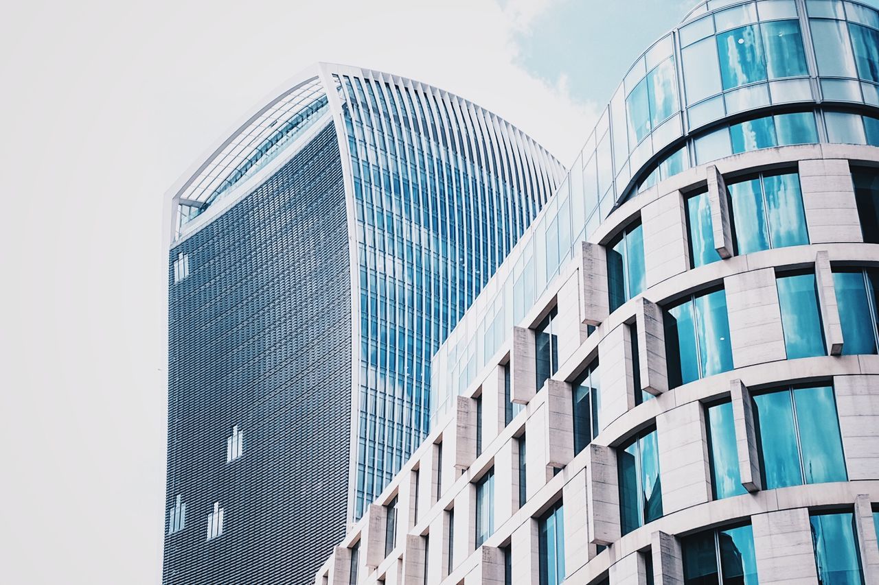 Low angle view of skyscraper against sky