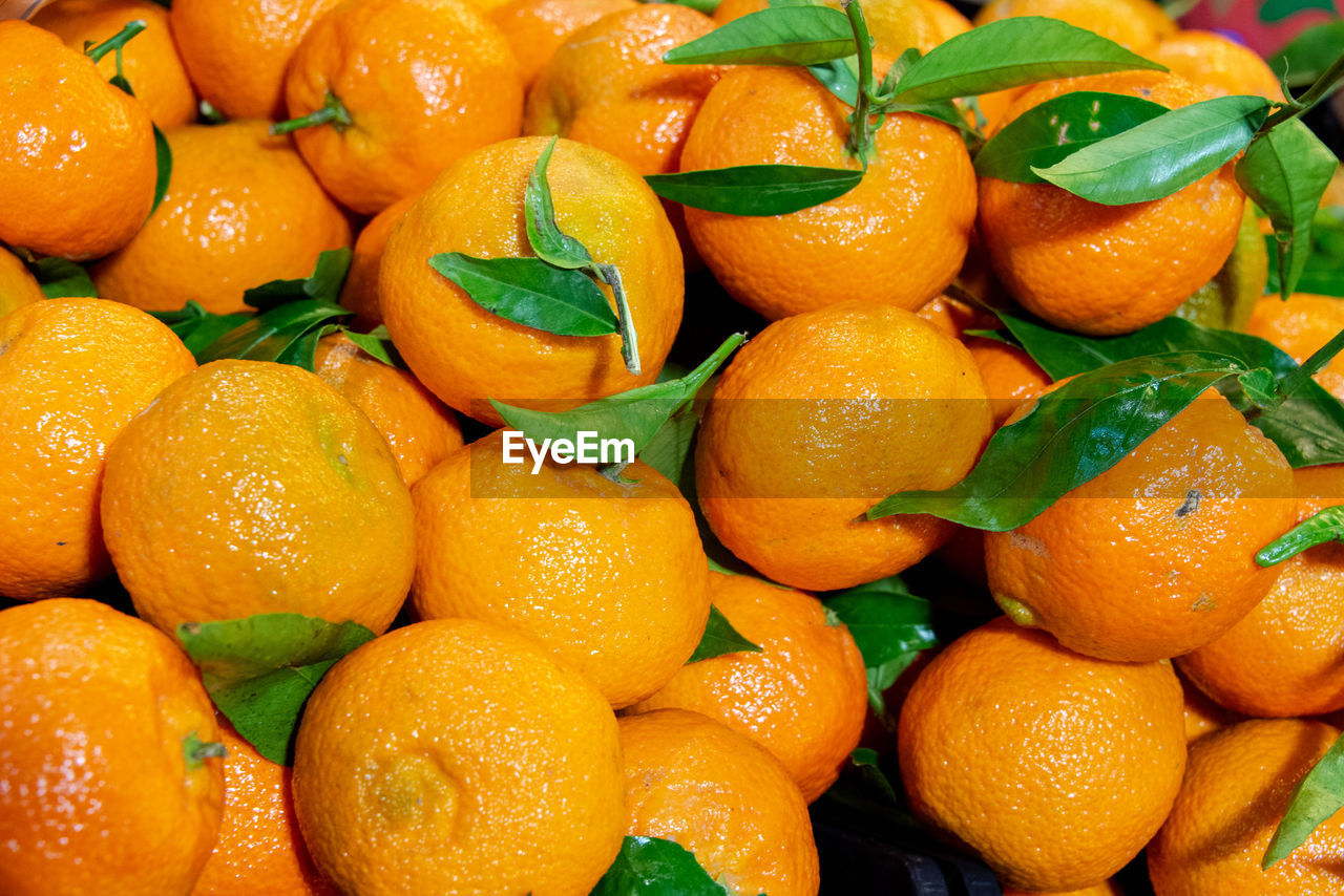 Full frame shot of oranges in market