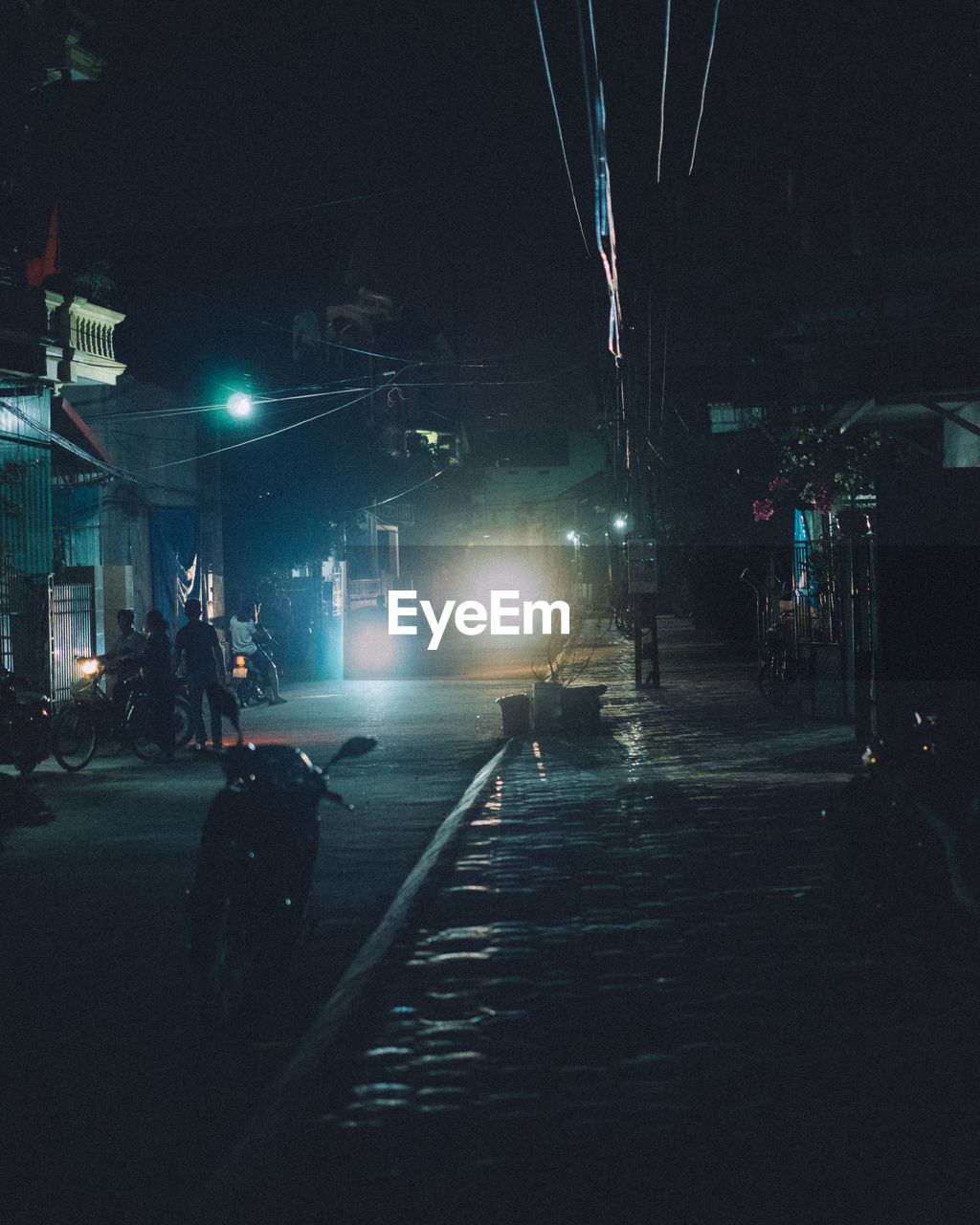 ILLUMINATED STREET AT NIGHT