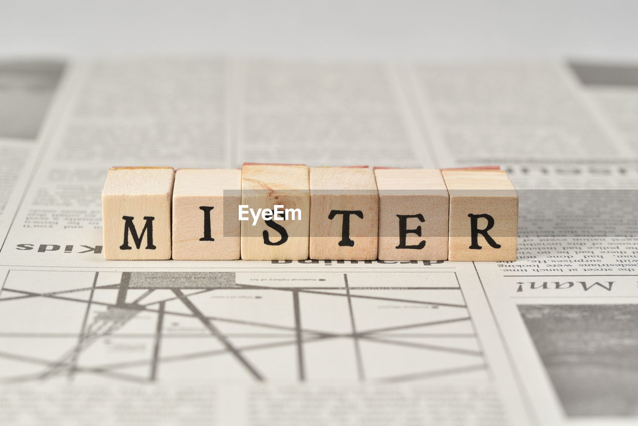 Close-up of text on wooden blocks