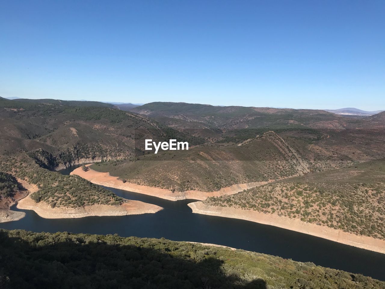 Scenic view of mountains against clear sky