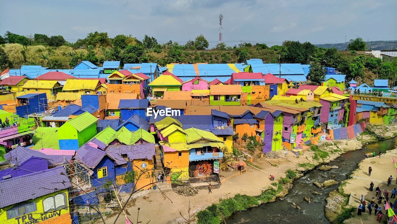 HIGH ANGLE VIEW OF MULTI COLORED BUILDING