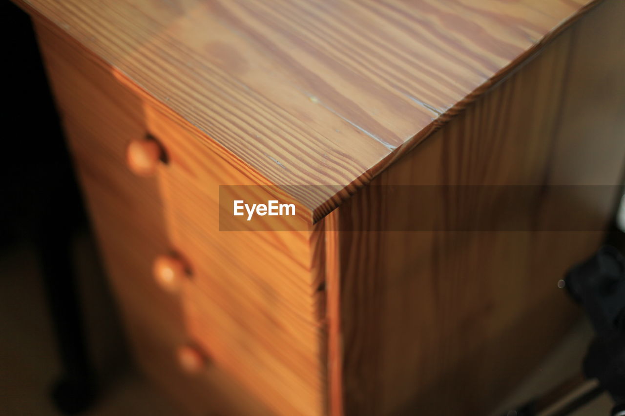 High angle view of wooden drawers at home