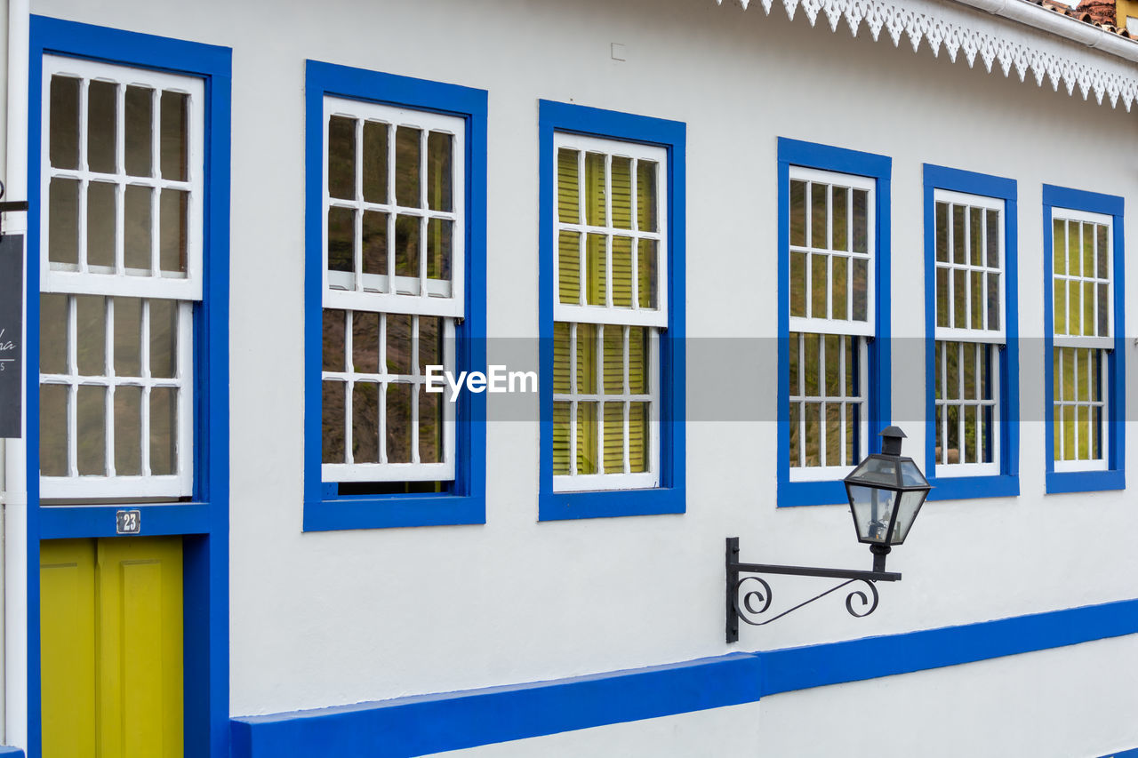 Close-up of blue windows on building