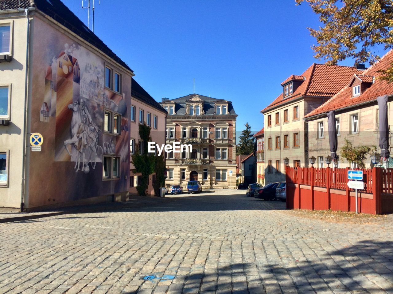 STREET AMIDST BUILDINGS IN TOWN