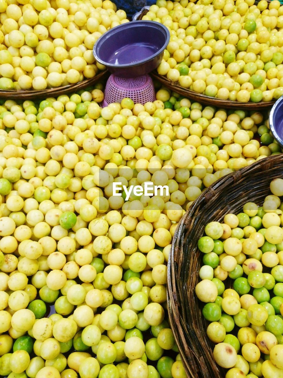 High angle view of lemons for sale in market