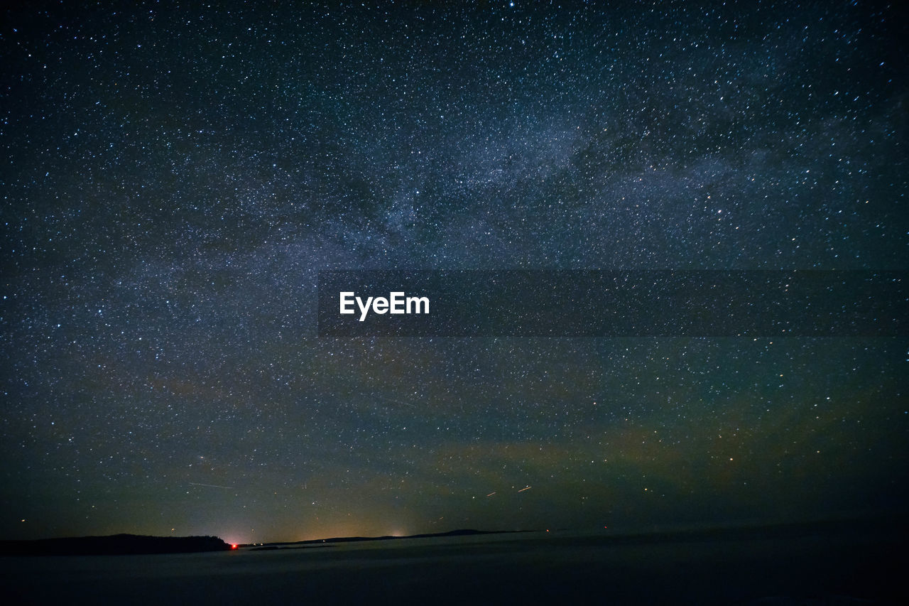 Scenic view of star field against sky at night