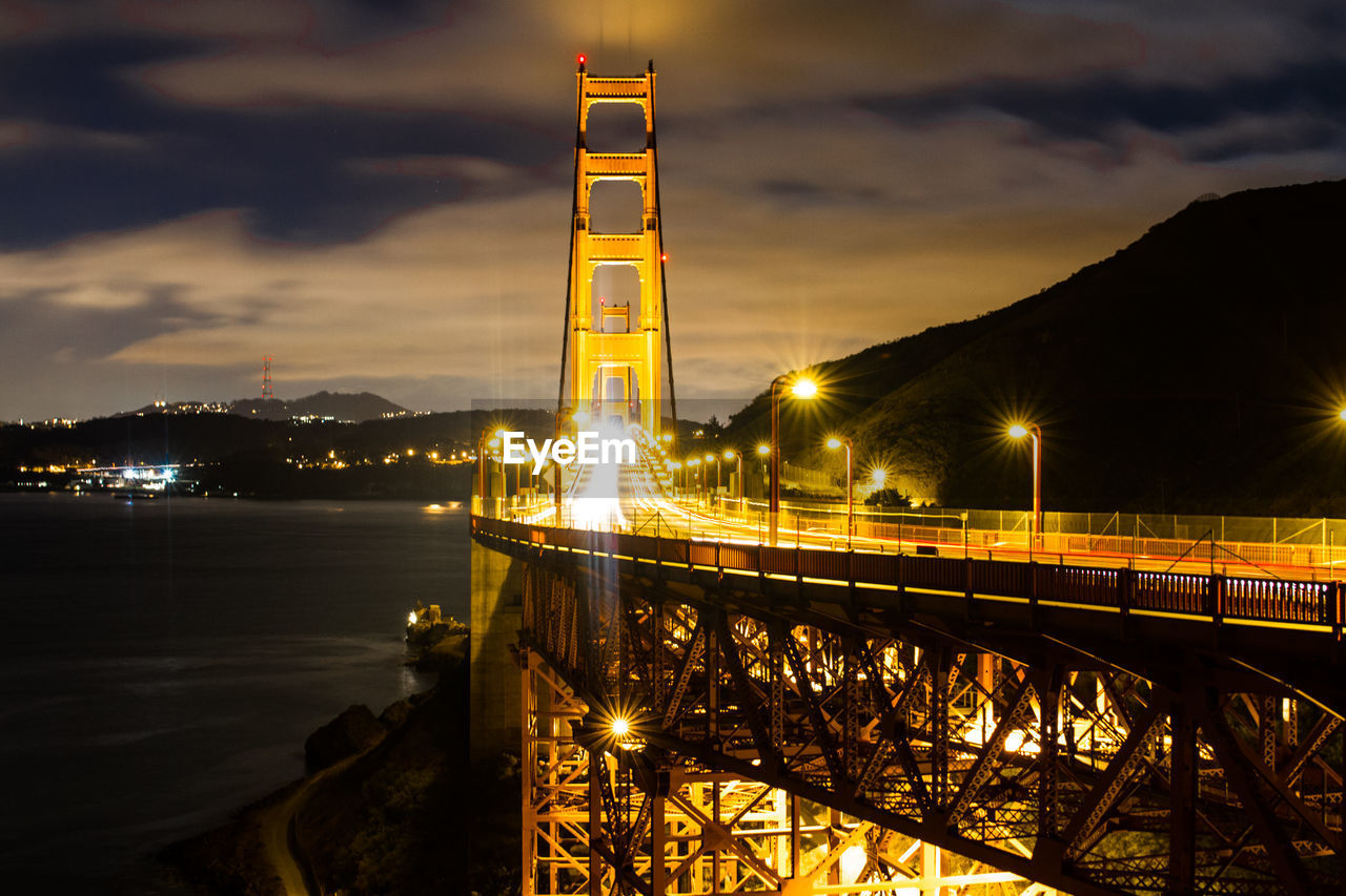 Illuminated golden gate bridge over san francisco bay at night