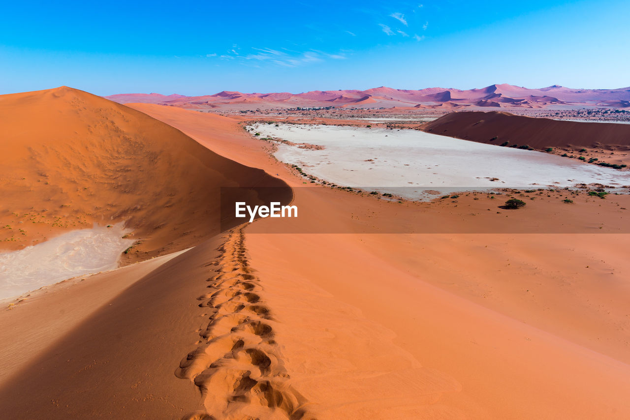 Scenic view of desert against clear sky