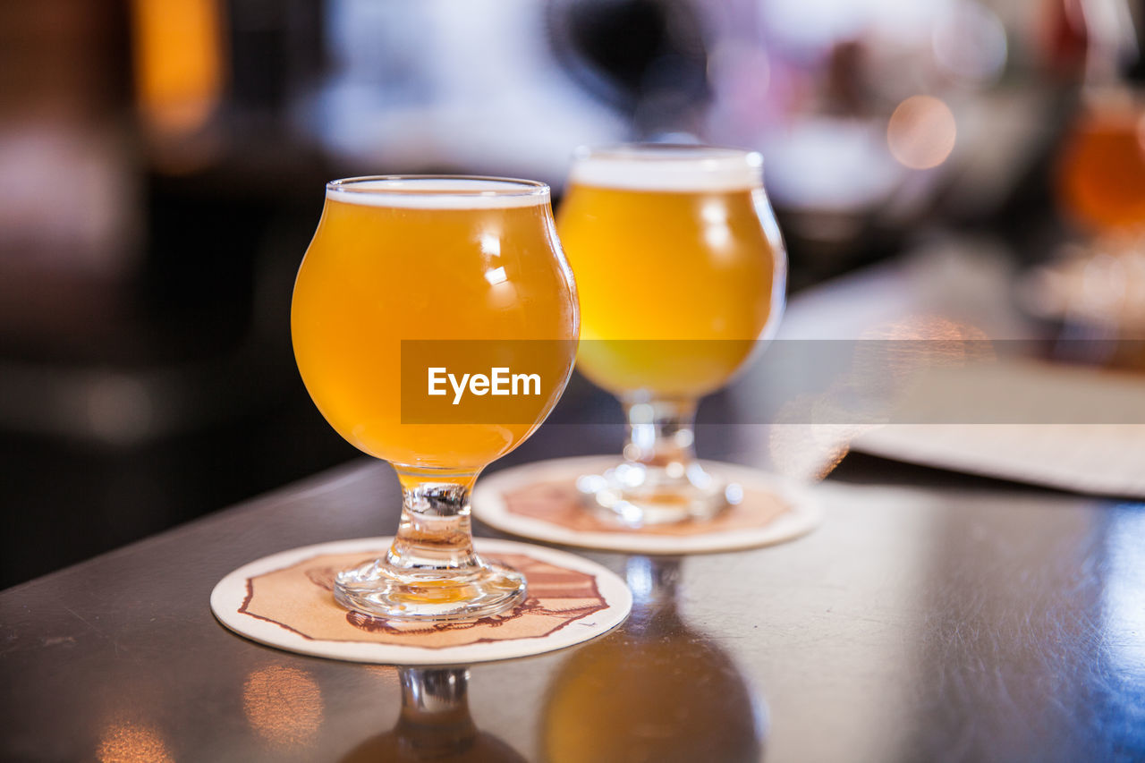 Close-up of beer glass on table