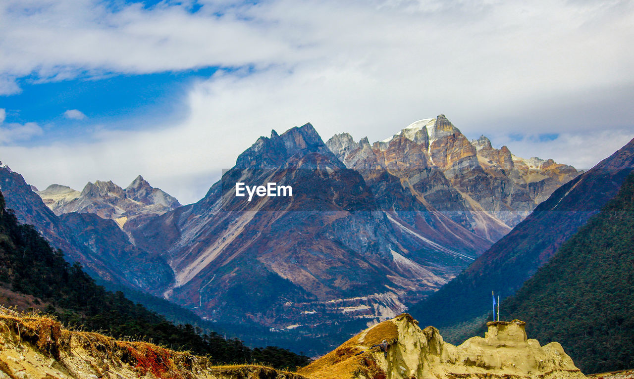 Panoramic view of landscape and mountains against sky