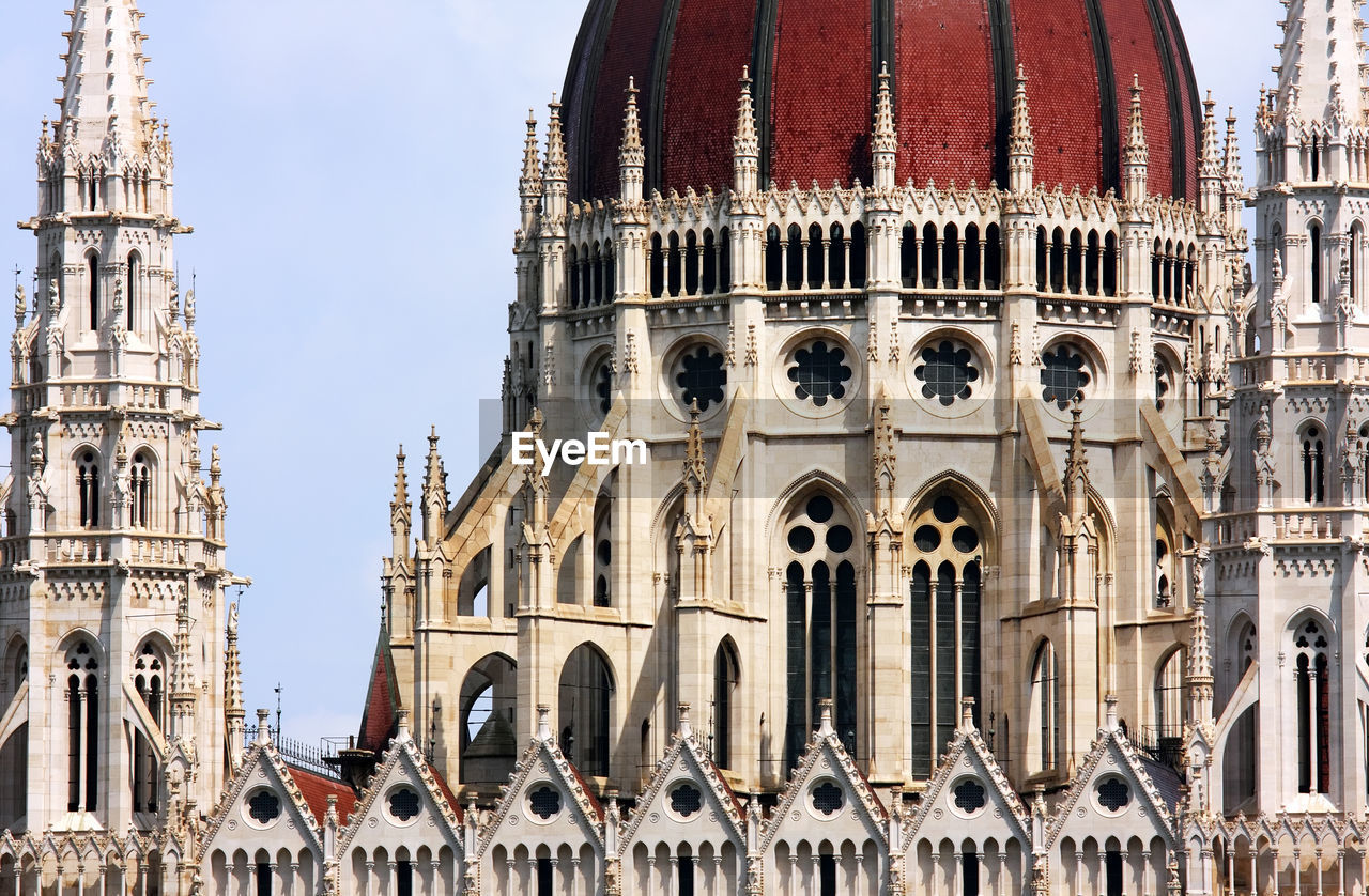 Close-up of hungarian parliament building against sky