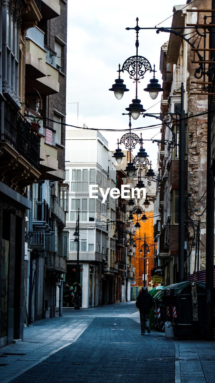 STREET AMIDST BUILDINGS IN CITY