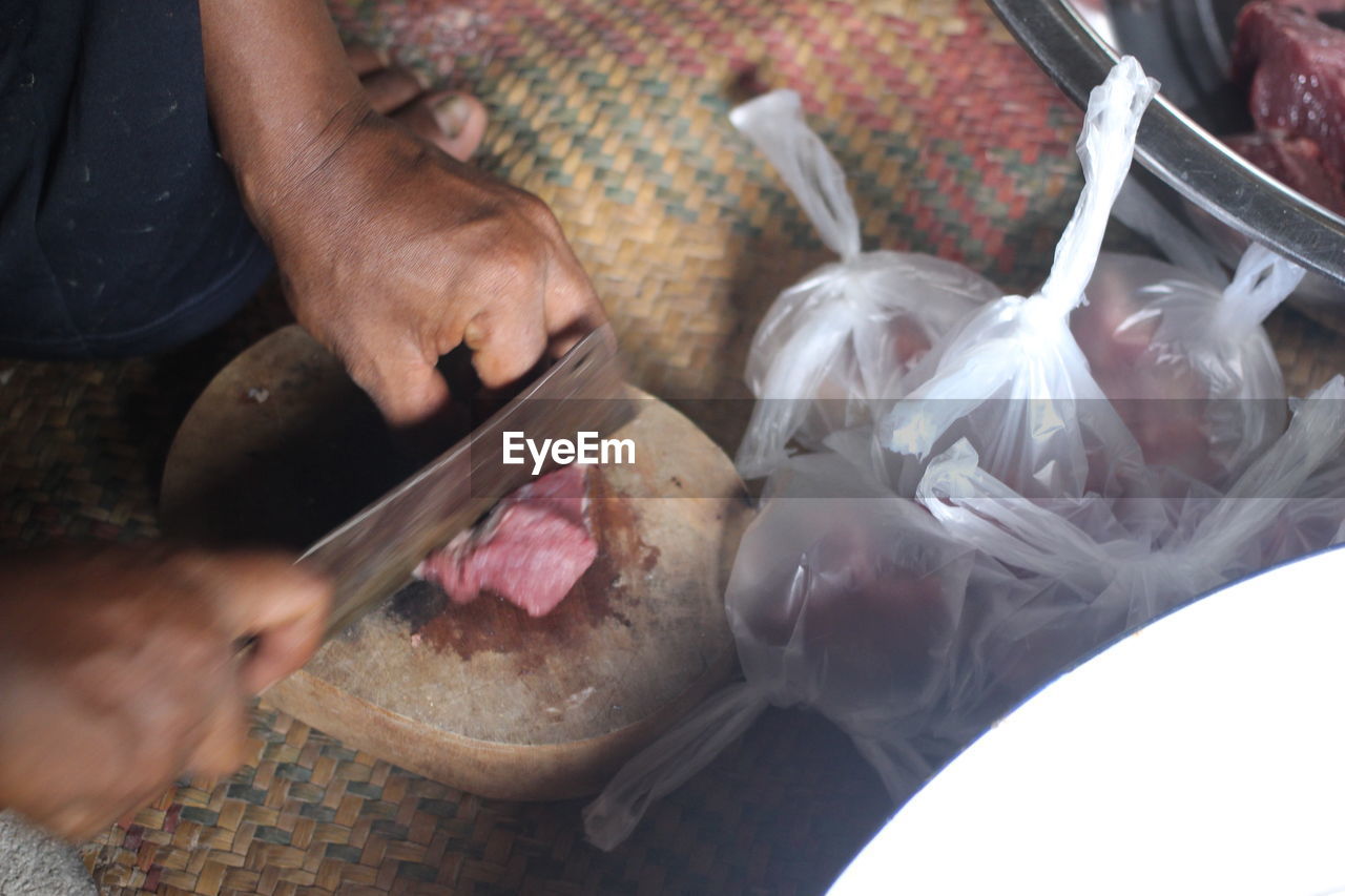 High angle view of man preparing food