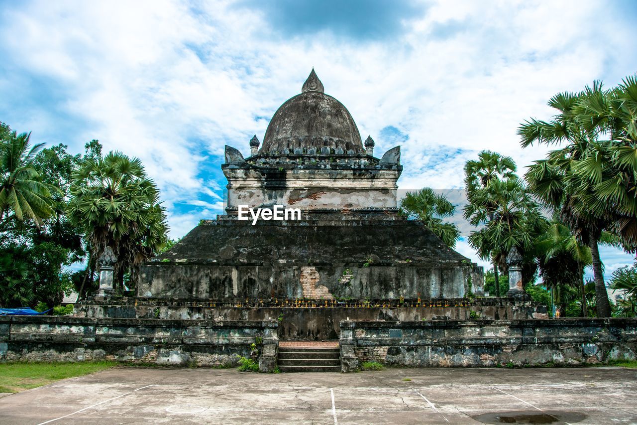 View of historic building against cloudy sky