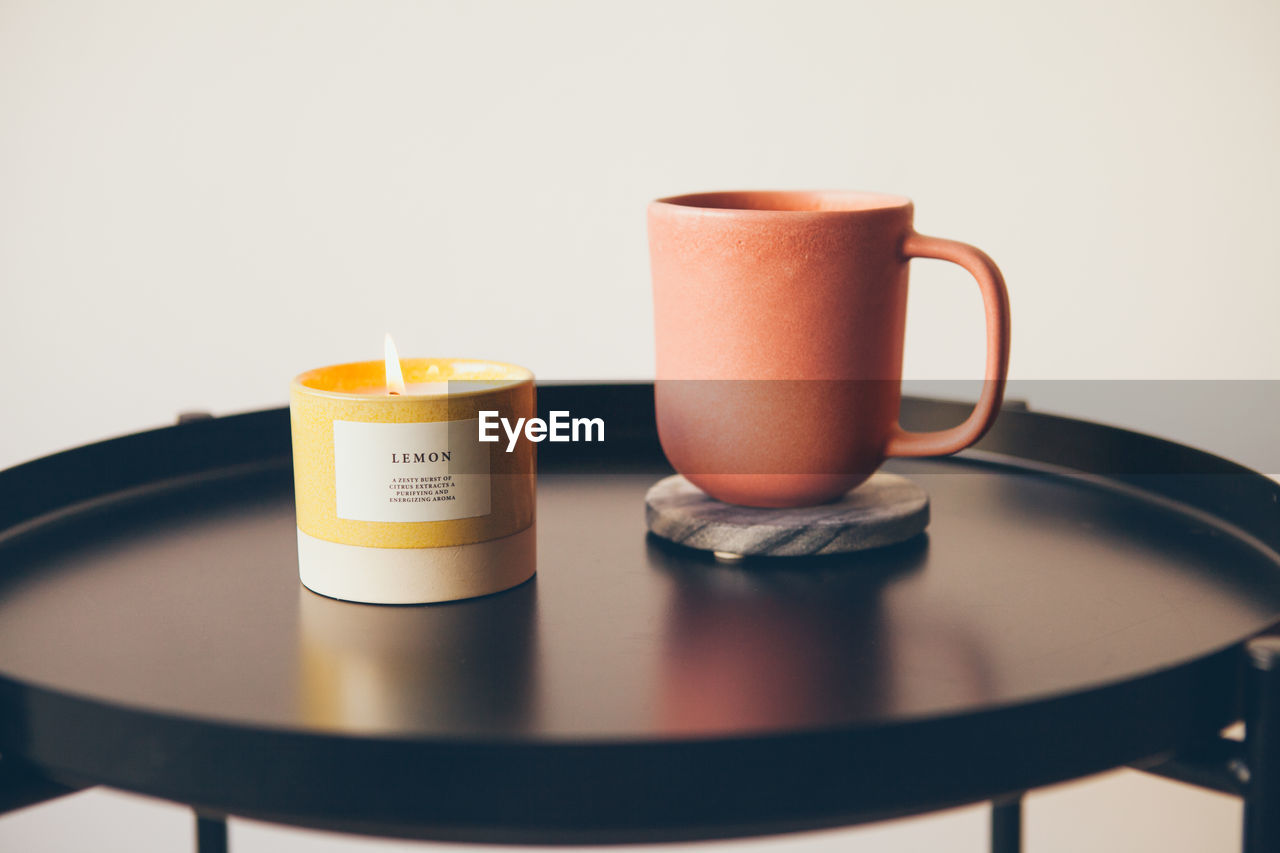 CLOSE-UP OF COFFEE SERVED ON TABLE