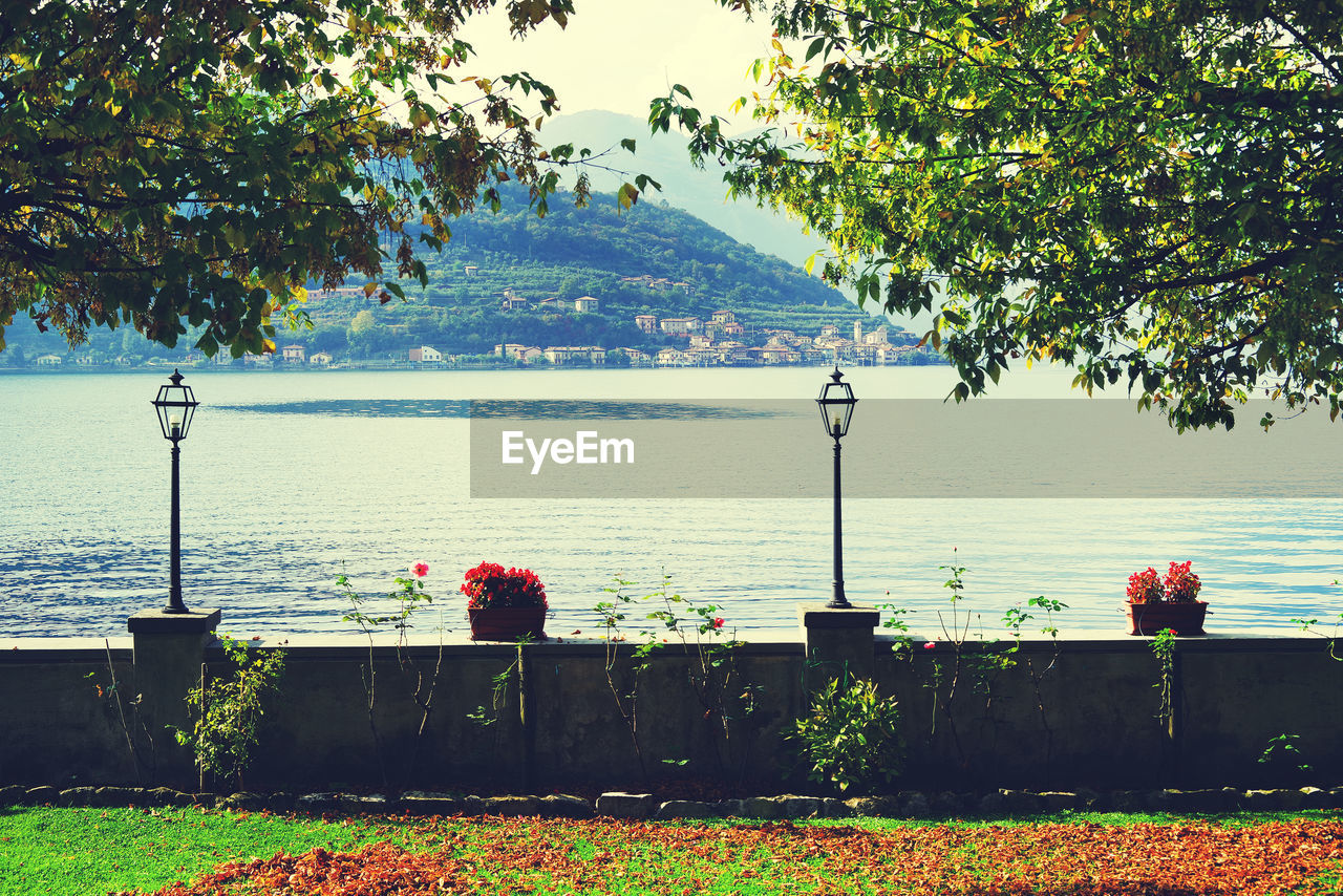 SCENIC VIEW OF LAKE AGAINST BLUE SKY