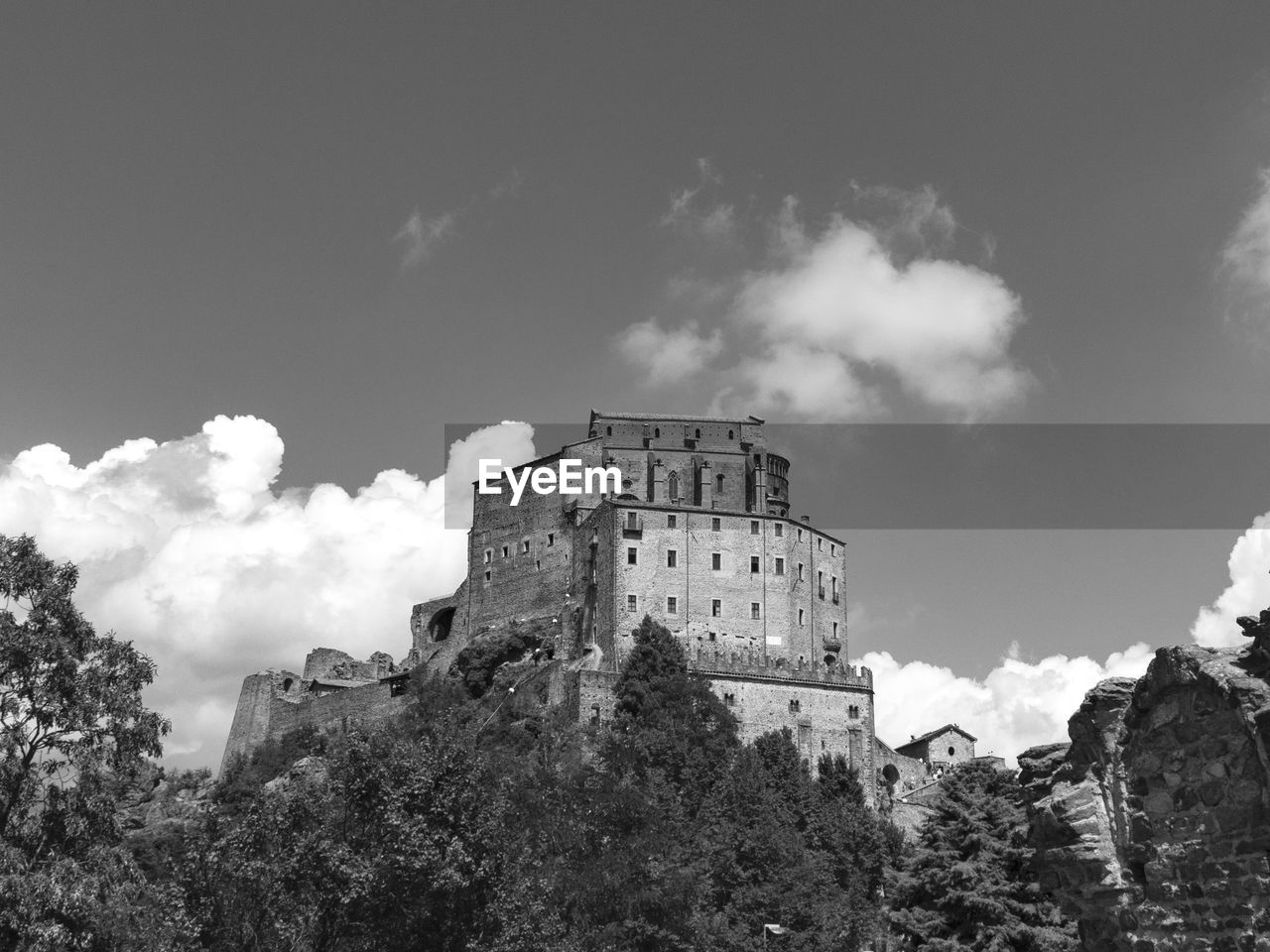 Low angle view of historical building against sky sacra di san michele