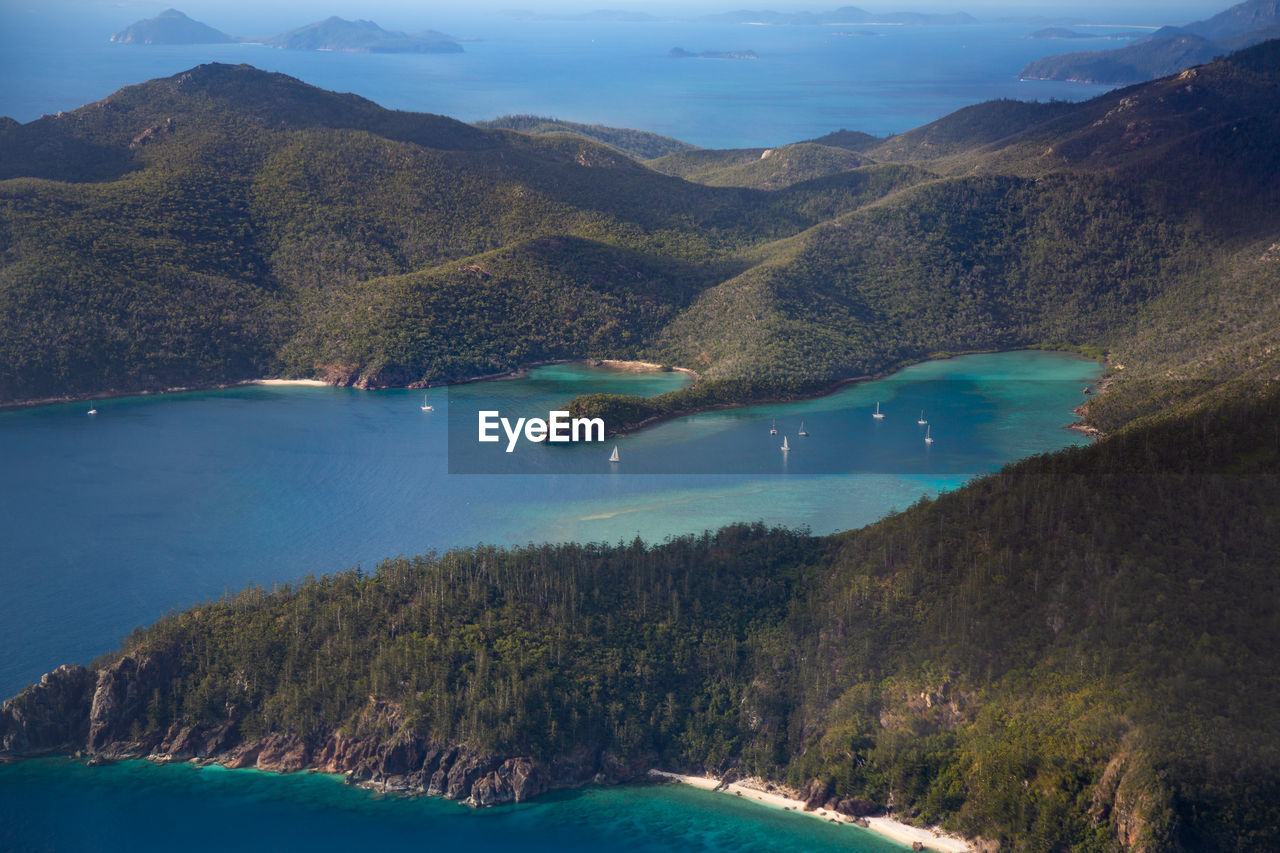 Scenic view of sea against mountains