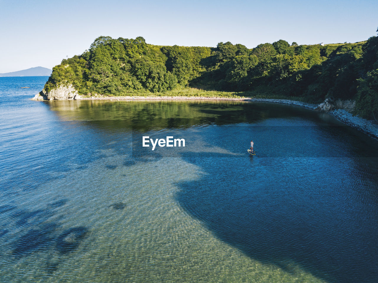 Aerial view of sup surfer, primorsky region, russia