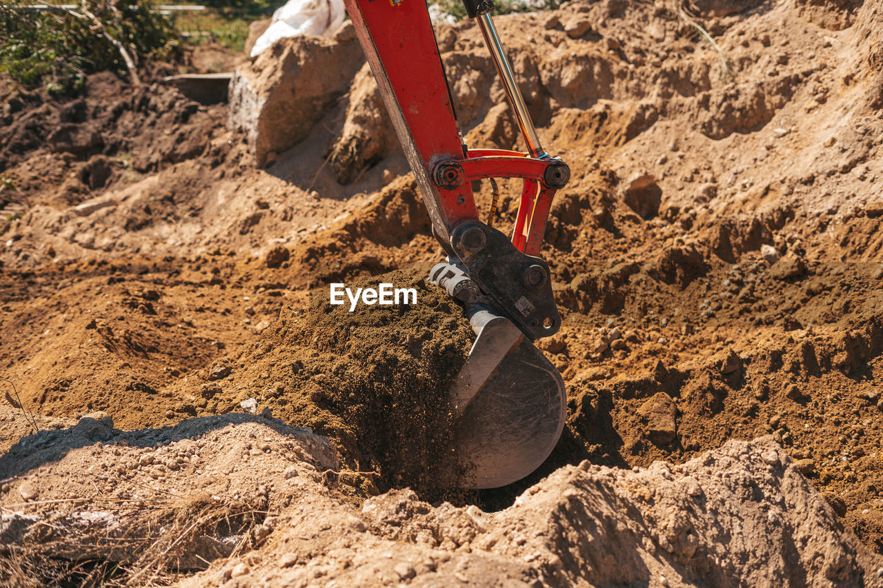 HIGH ANGLE VIEW OF CONSTRUCTION SITE IN CAVE