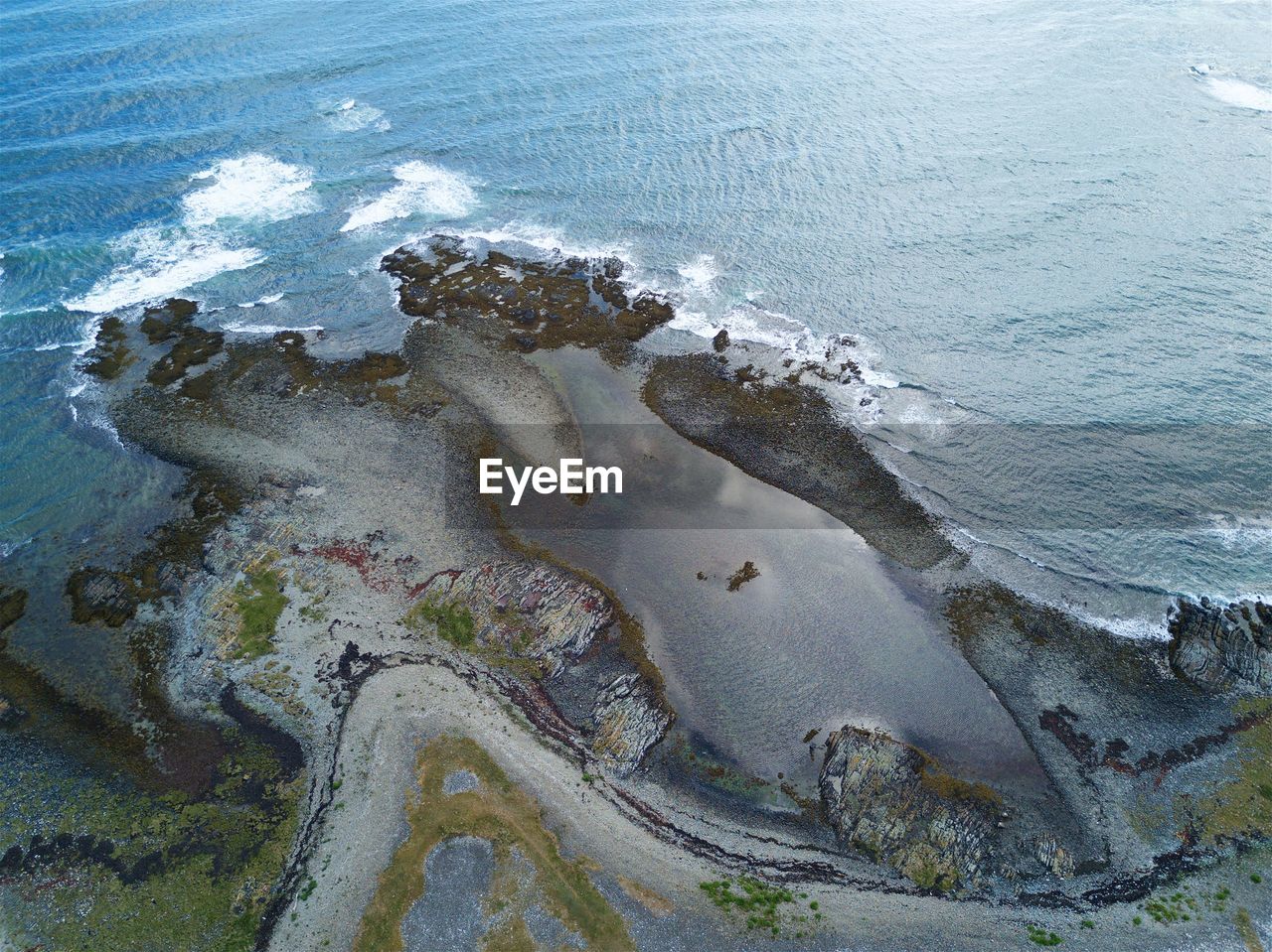 HIGH ANGLE VIEW OF SHORE