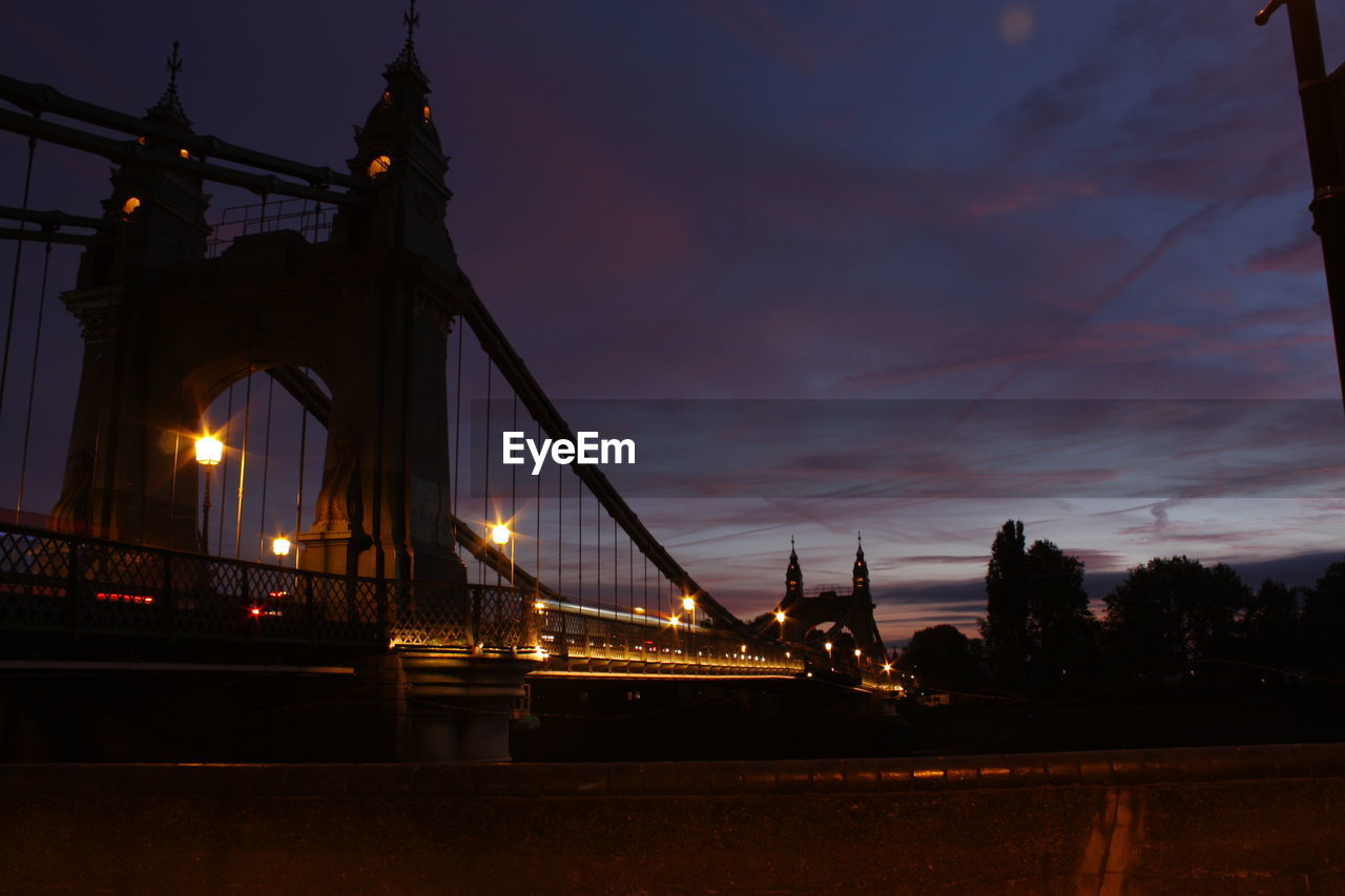 SUSPENSION BRIDGE AT NIGHT