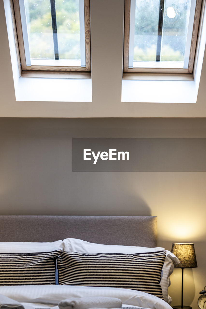 Empty bed and table at home