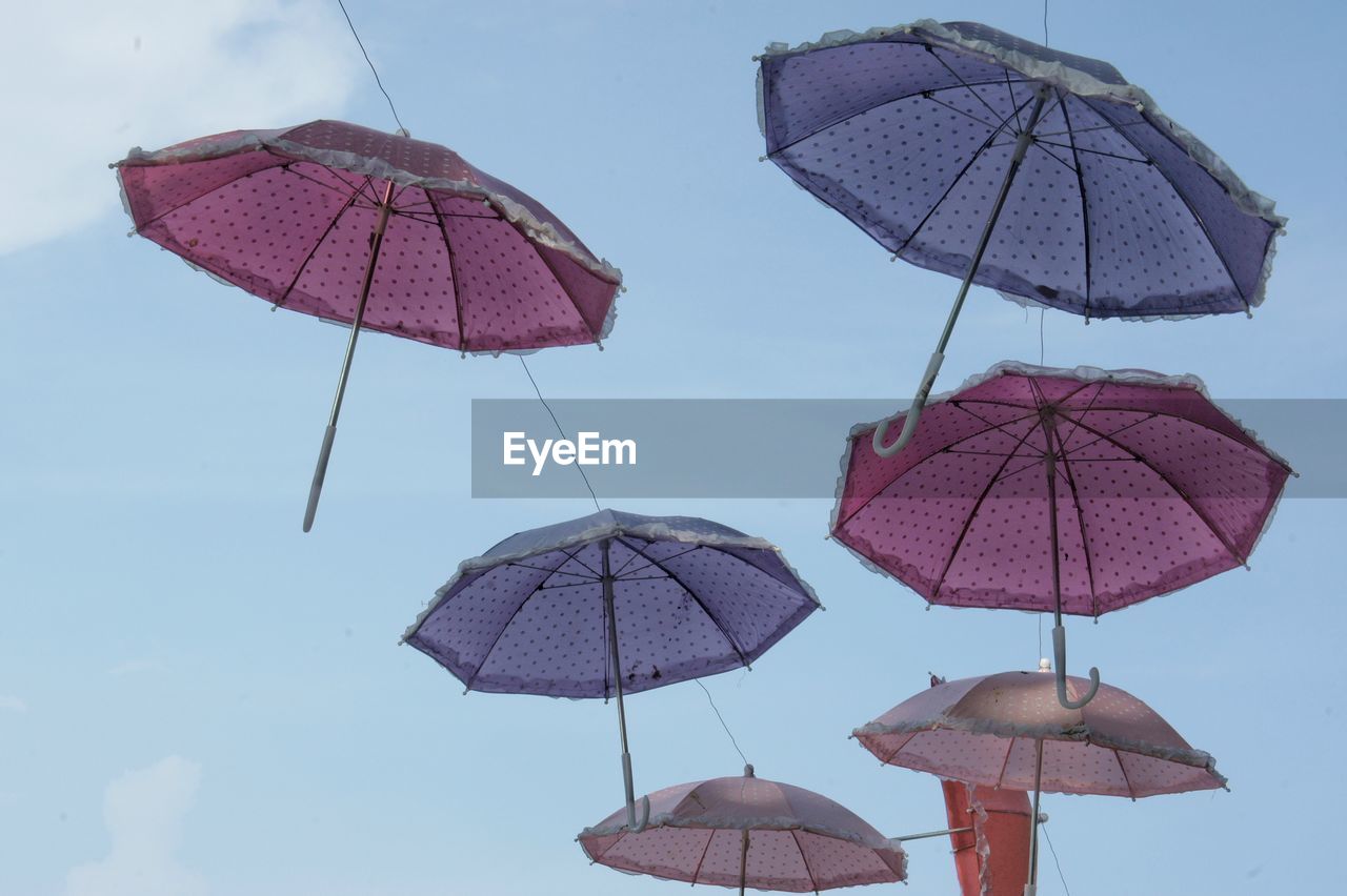 umbrella, protection, fashion accessory, security, parasol, rain, sky, wet, nature, low angle view, day, no people, outdoors, water, sunshade, shade, beach umbrella, cloud, shield
