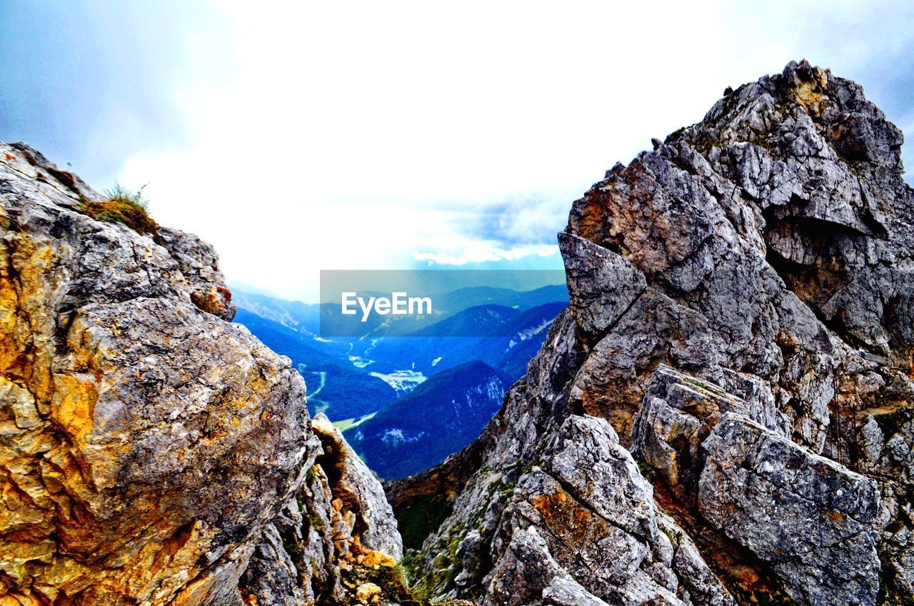 PANORAMIC SHOT OF MOUNTAINS AGAINST SKY