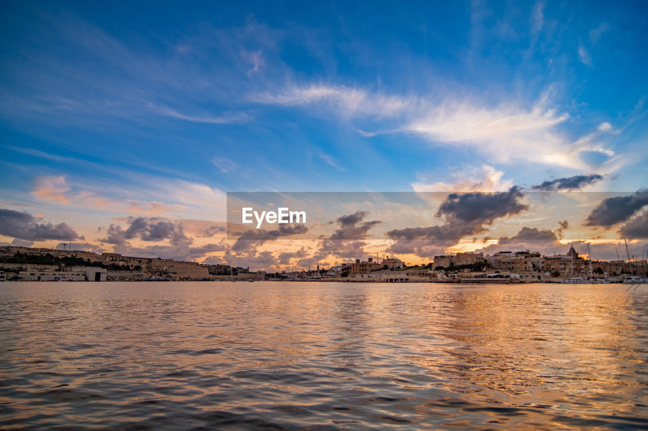 SCENIC VIEW OF SEA DURING SUNSET