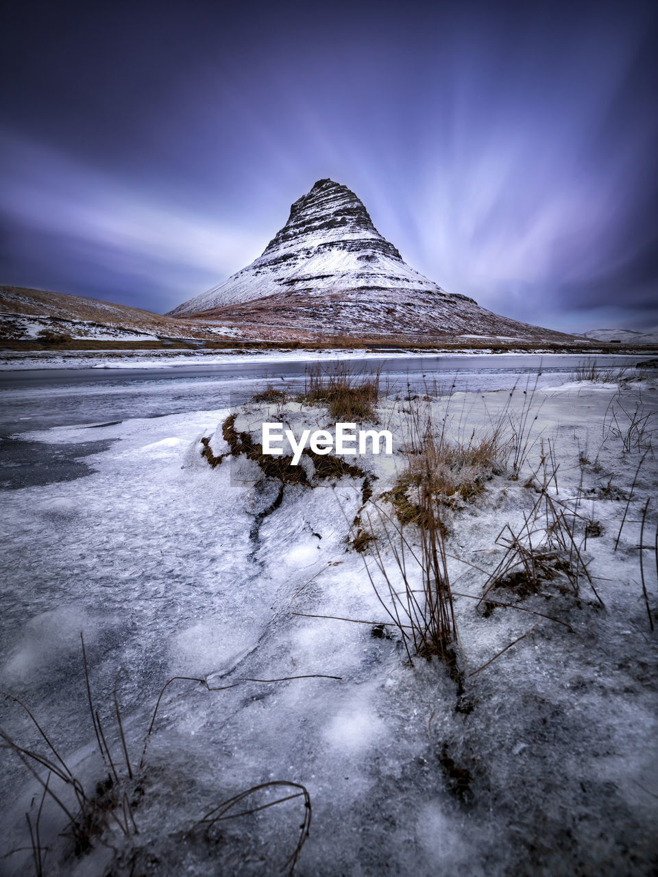 Snow covered mountain against sky