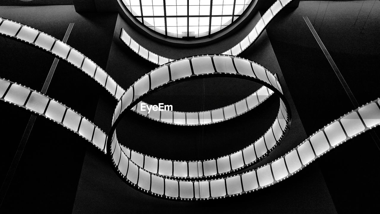 Low angle view of spiral staircase in building