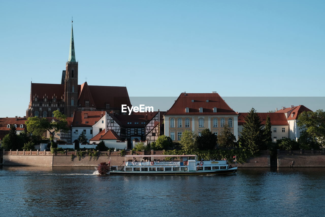 River by city against clear sky