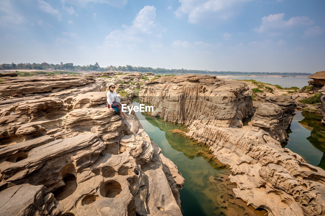 Scenic view of rock formations against sky